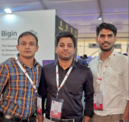 Three attendees at a conference